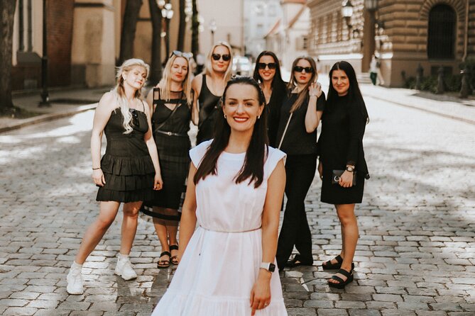 1H Private Photoshoot in Old Town of Riga - Kalku Varti and the Laima Clock