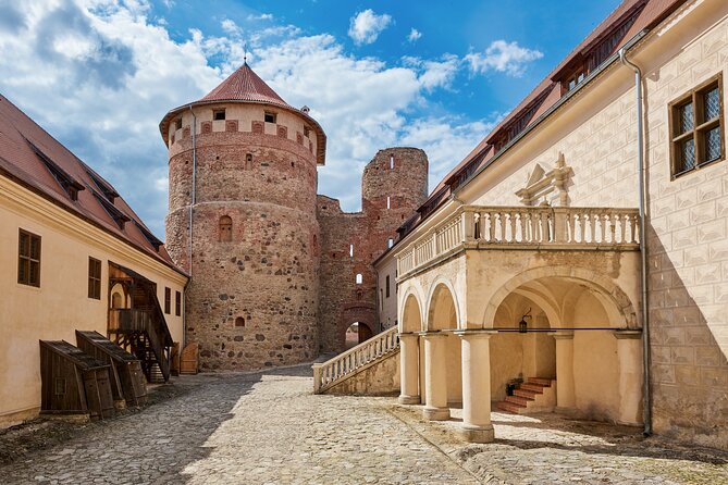 Private Full-Day Trip to Hill of Crosses, Rundale Palace & Bauska - Bauska Castle and the River Musa views