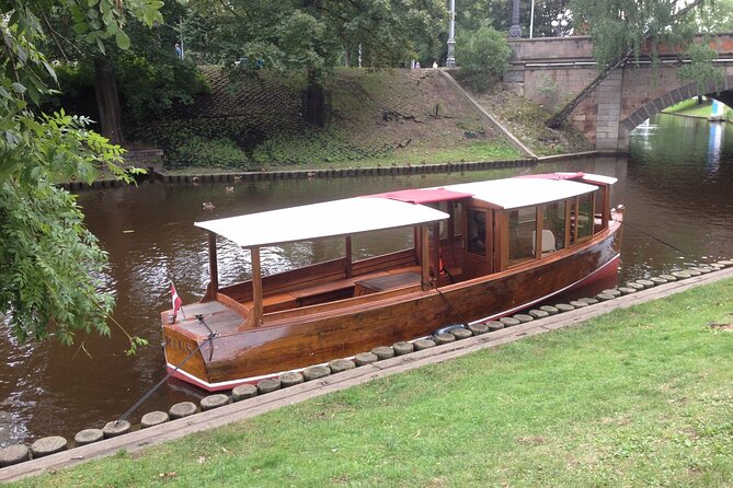 Riga Canal and Daugava Boat Tour with Welcome Drink & Audio Guide - What the 50-minute route gives you