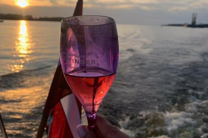 Riga: Evening or Sunset Boat Tour with Drink and Audio Guide - Why this short Riga cruise works