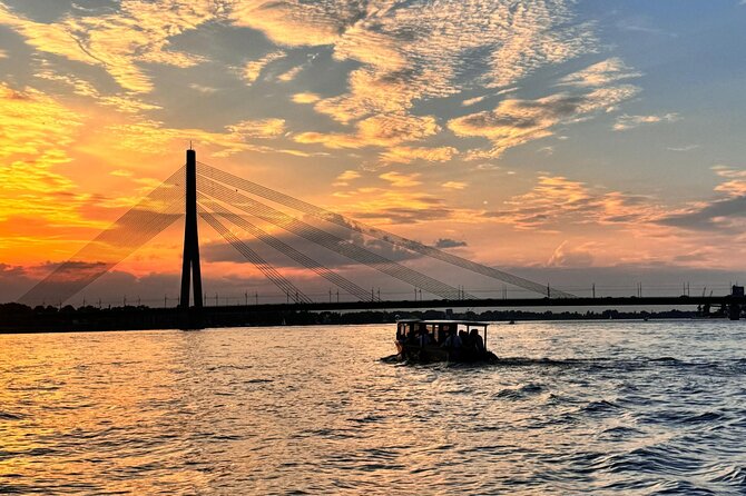 Riga: Evening or Sunset Boat Tour with Drink and Audio Guide - Choosing sunset or nighttime
