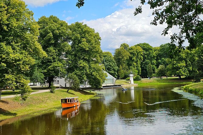 Riga: Evening or Sunset Boat Tour with Drink and Audio Guide - What to expect from the audio guide