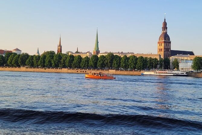 Riga: Evening or Sunset Boat Tour with Drink and Audio Guide - What the $13.88 price really gives you