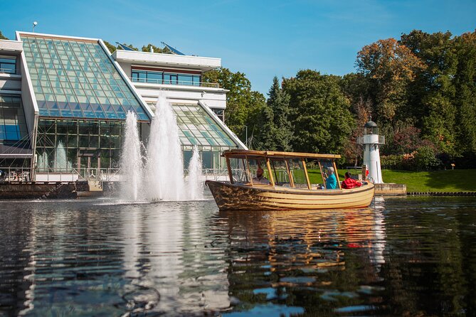 Riga Sightseeing Tour by Canal Boat with Audioguide - Starting among Riga’s parks and monuments